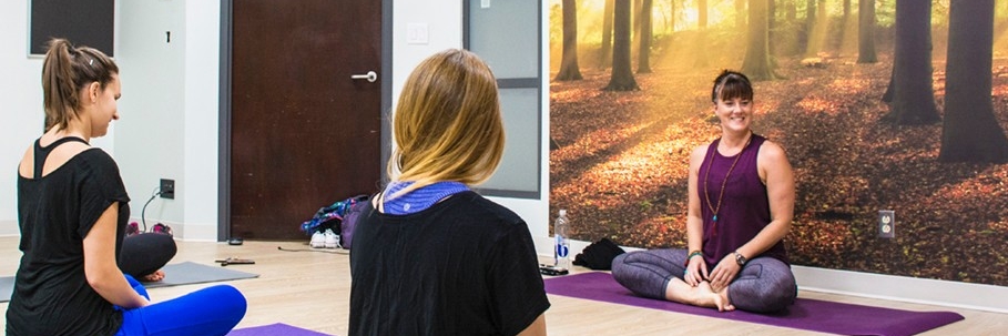 Yoga mats set up on the floor in the SFU Vancouver Wellness Studio