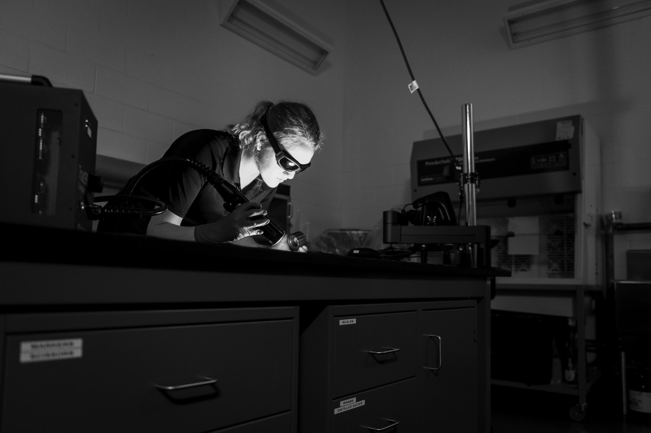 single researcher in black and white photo