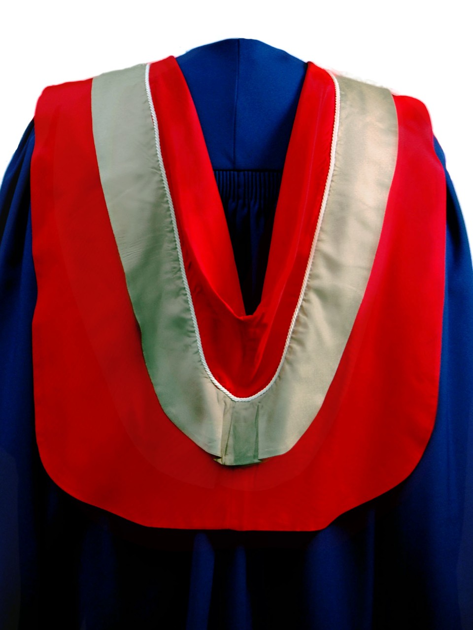 The Master of Science in the Faculty of Applied Science hood is red with wide fawn border and white cording