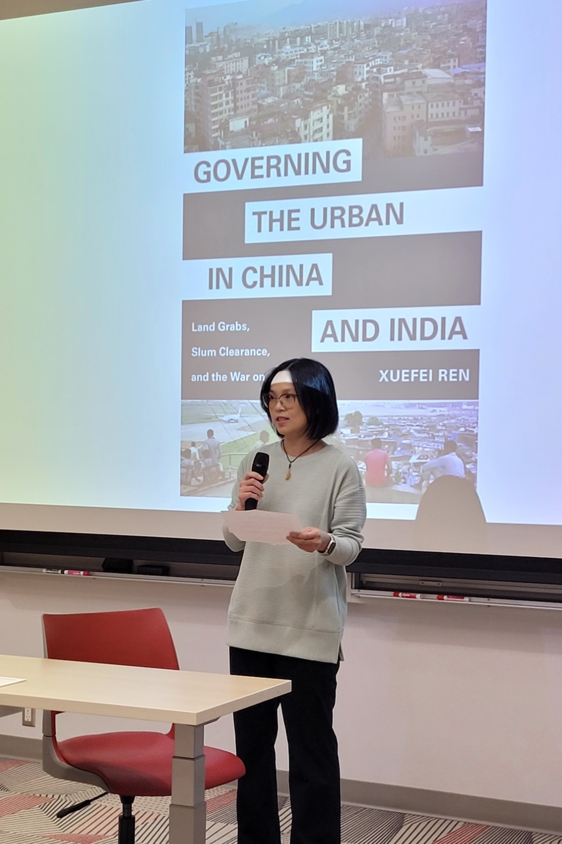 Yushu Zhu provides opening remarks