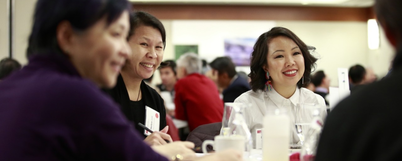 Participants smiling and speaking together during the dialogues for establishing a Chinese Canadian Museum in B.C.