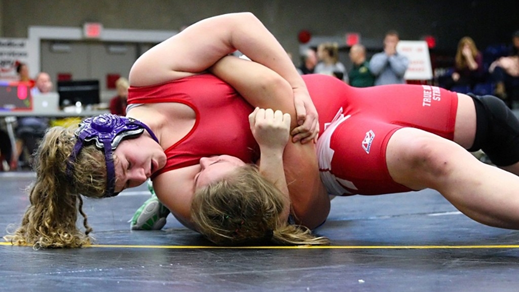 Payten Smith won a full-ride athletic scholarship to wrestle at SFU. She won several provincial, national and international wrestling titles until a neck injury ended her career. Payten has served as the SFU Women’s Wresting team student manager and coach’s aid, and continues to volunteer within the wrestling community. Photo: Ron J. Hole/SFU Athletics