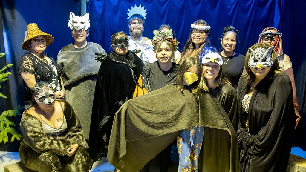 The cast of Jealous Moon, a play in Hul’q’umi’num’written by Chris Alphonse. The play was performed by SFU undergraduate and graduate students in the Indigenous Languages Program for an appreciative audience in Duncan, B.C. in 2019. Back row: Gina Salazar, Christopher Alphonse, Thomas Johnny, Rae Anne Claxton Baker, Tammy Jack, Kathleen Johnnie; front row: Sharon Seymour, Roseanna George, Marlene Tommy, Theresa Seward, Tara Morris, Martina Joe. Photo: Cim MacDonald.