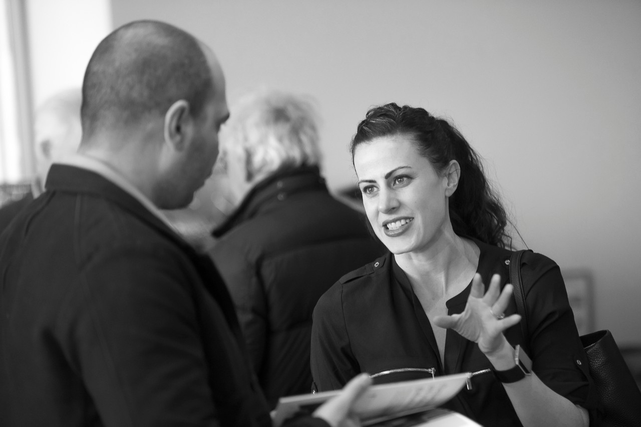 Sabrina Higgins speaks to community member at a SNF Centre for Hellenic Studies event during fall 2019
