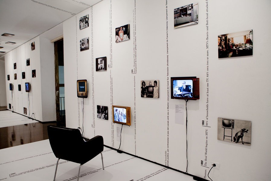 Judith Barry/Ken Saylor/Project Projects, From Receiver to Remote...channeling Spain, 2010. Installation with Spain/US timeline + TV programming, 91 photographs, 10 flat screens with audio, dimensions variable.