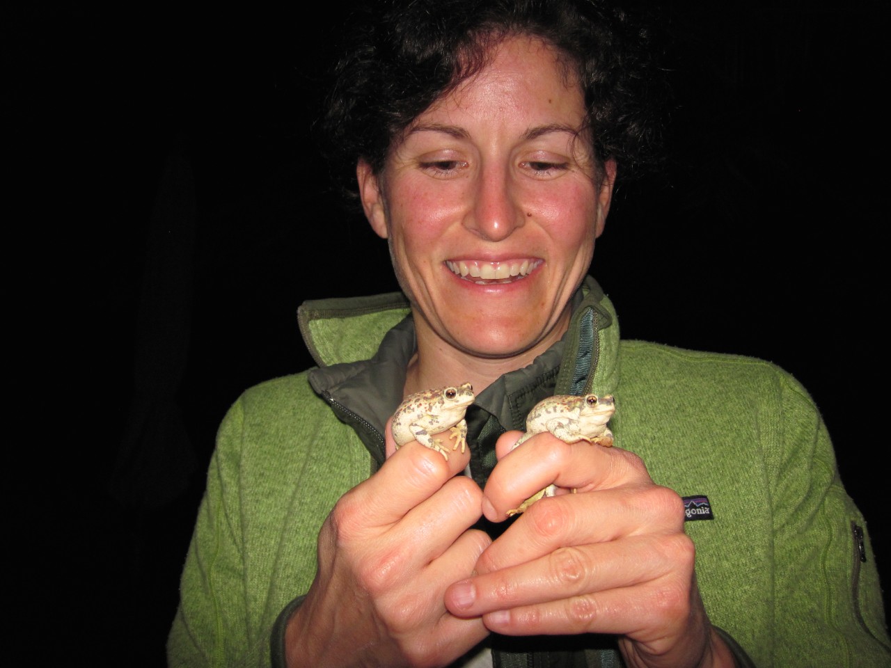 Dr. Wendy Palen holding a frog