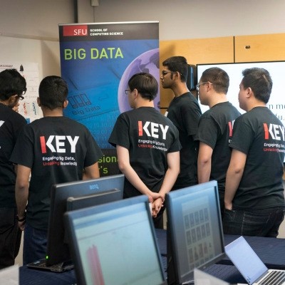 Big Data hub - students crowded around a presentation