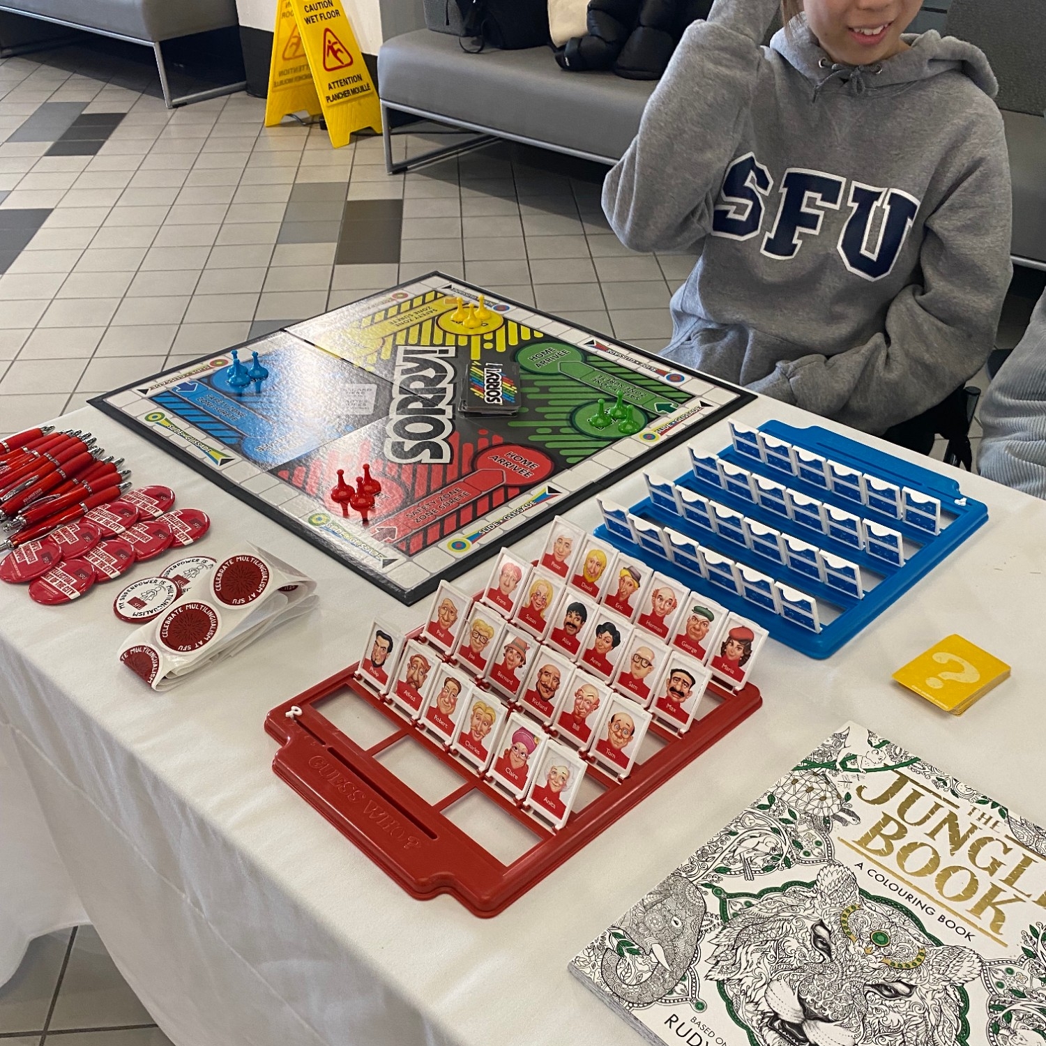 Multiple board games set up at board games table for Multilingual Week 2023 at Vancouver campus