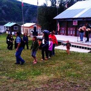 Ross River Drummers get the audience moving at the 2012 Moosehide Gathering