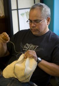 Jeremiah James in Sitka, AK, teaching a Skin Sewing Workshop - part of SHI's Sus
