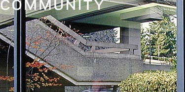 'Community' & picture of outdoor stairwell and trees through a window