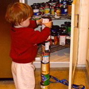 Child with Autism stacking cans