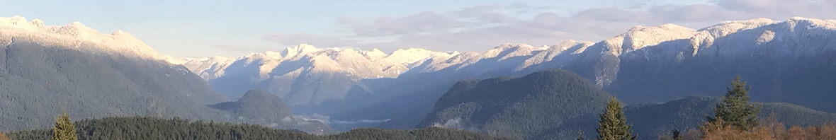 Snow on the North Shore mountains across from SFU