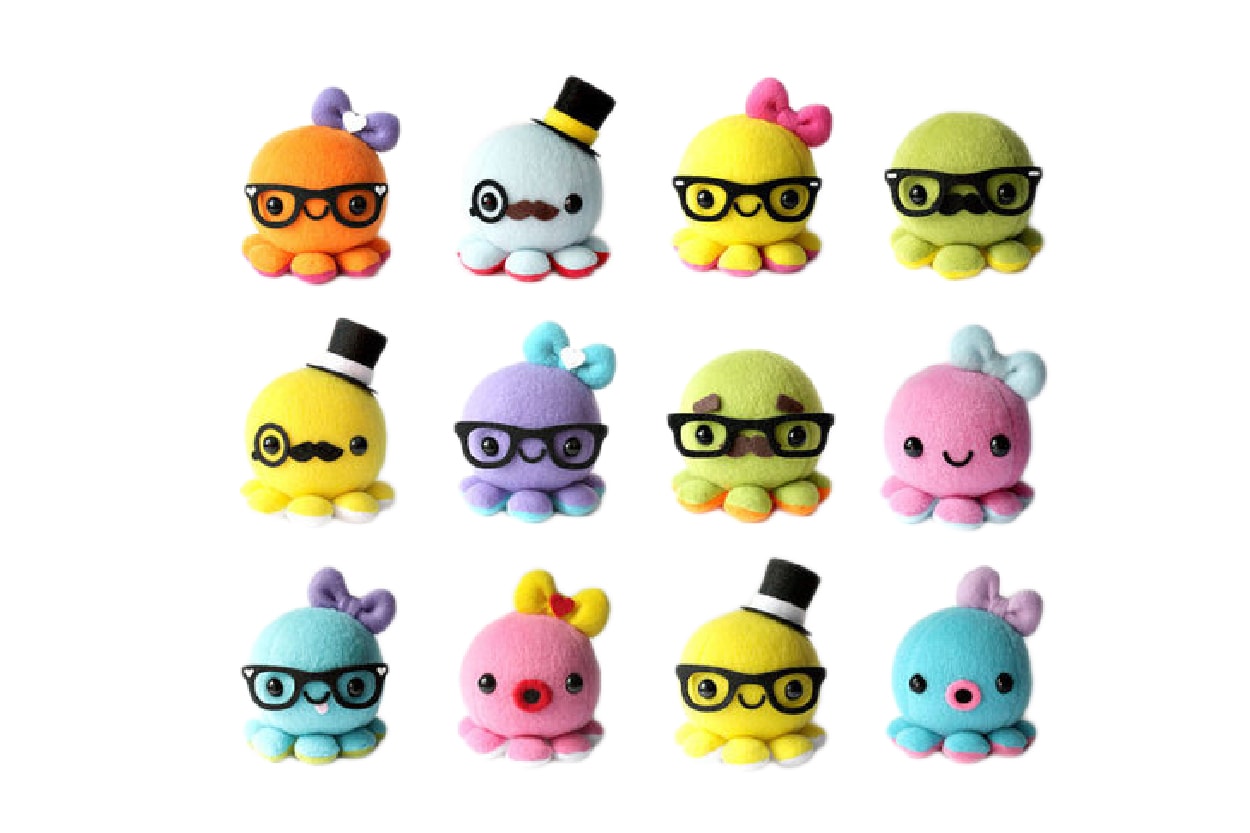Multiple octopus plushes each wearing various costumes, all of which the plushes are placed a grid layout