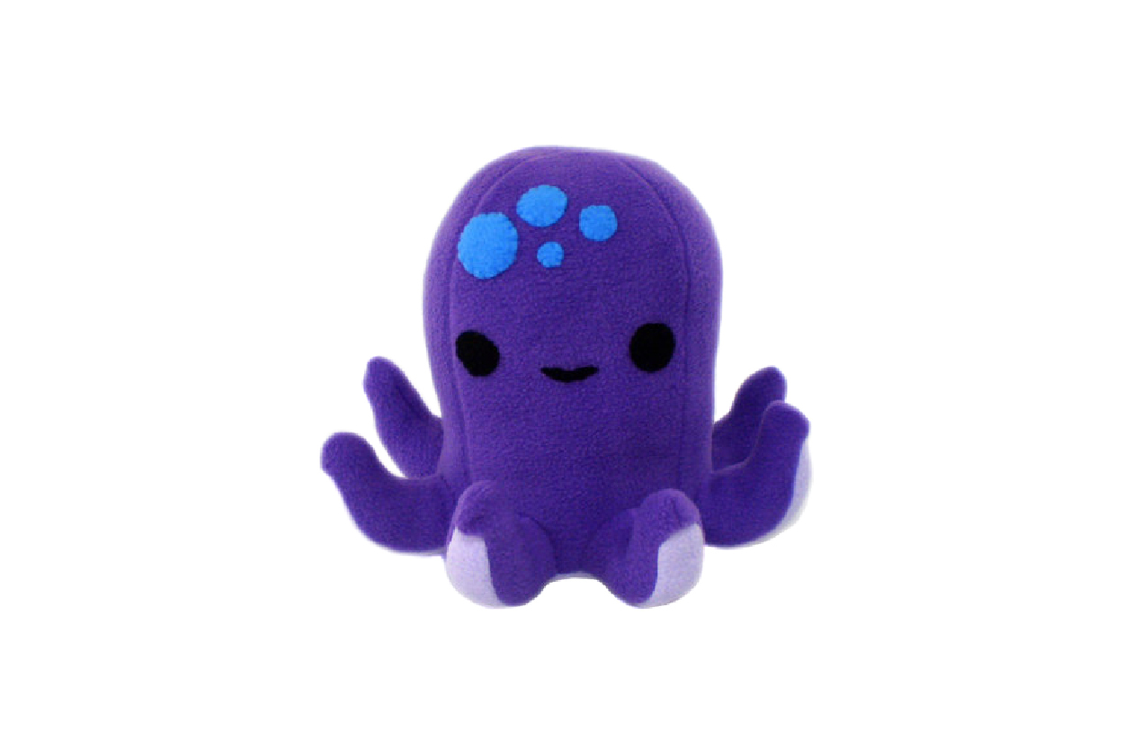 A tall dark purple octopus plush with four blue spots on its head
