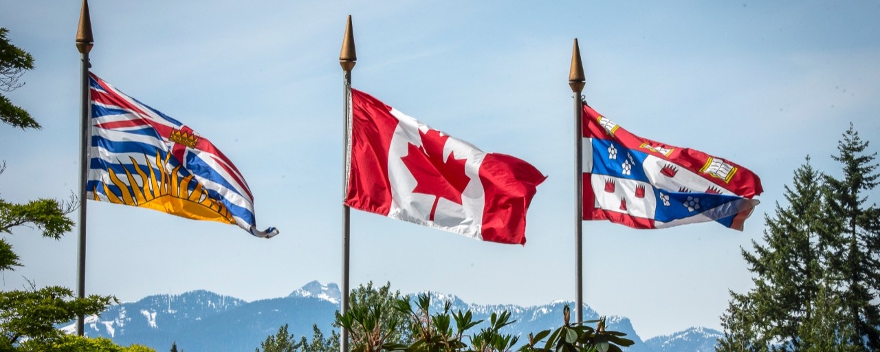SFU, Canada, and BC flags on display