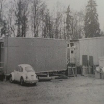 A historical photo of a temporary classroom structure