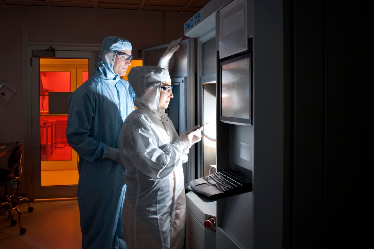colour photo - two researchers in a lab