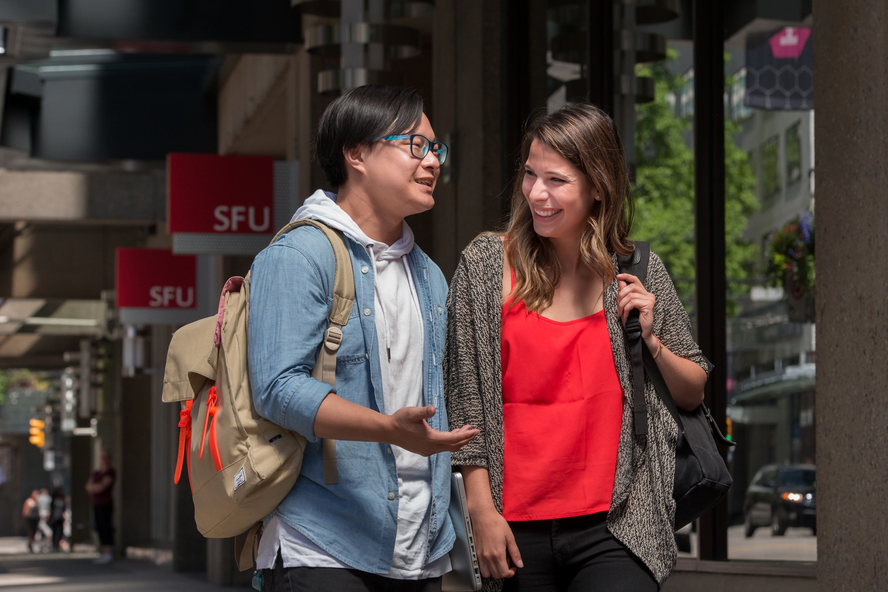 This is an image of two SFU students talking outside