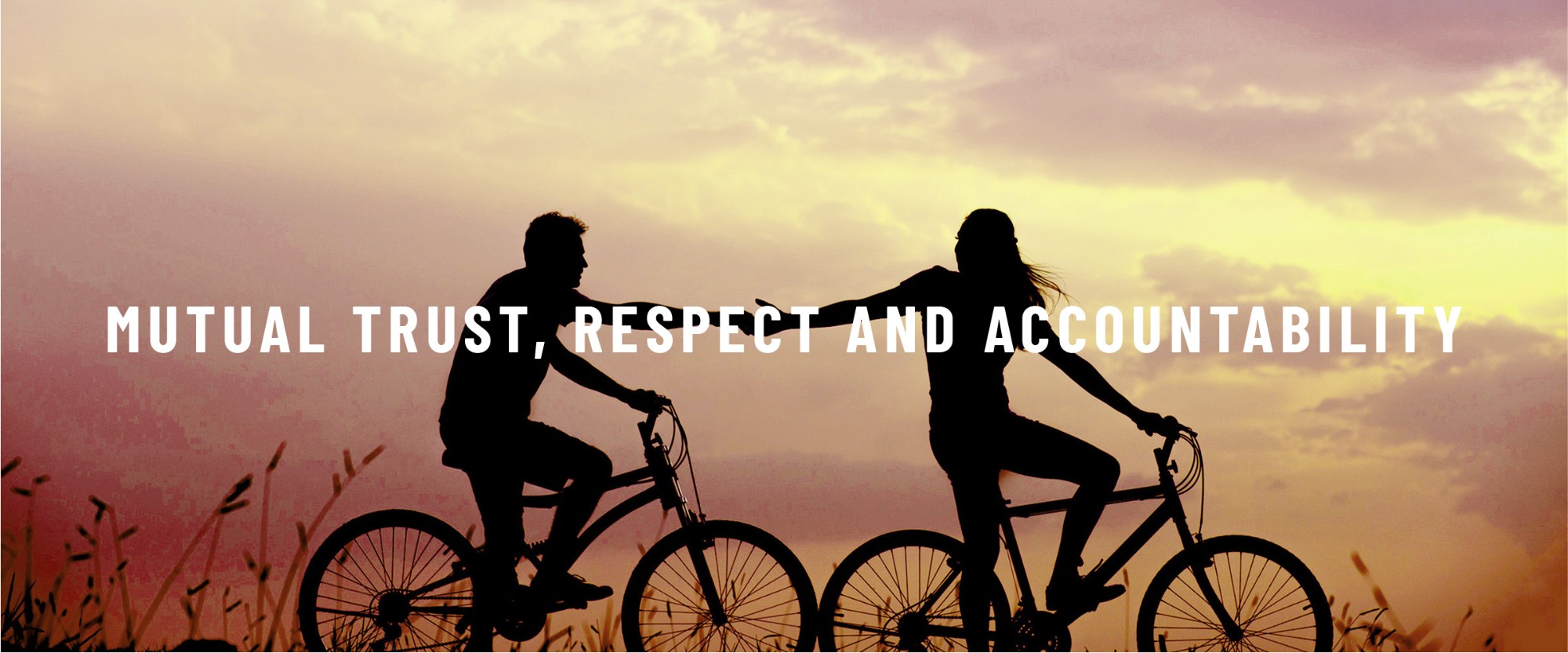 Image: Two people riding bikes holding hands Text: Mutual trust, respect and accountability