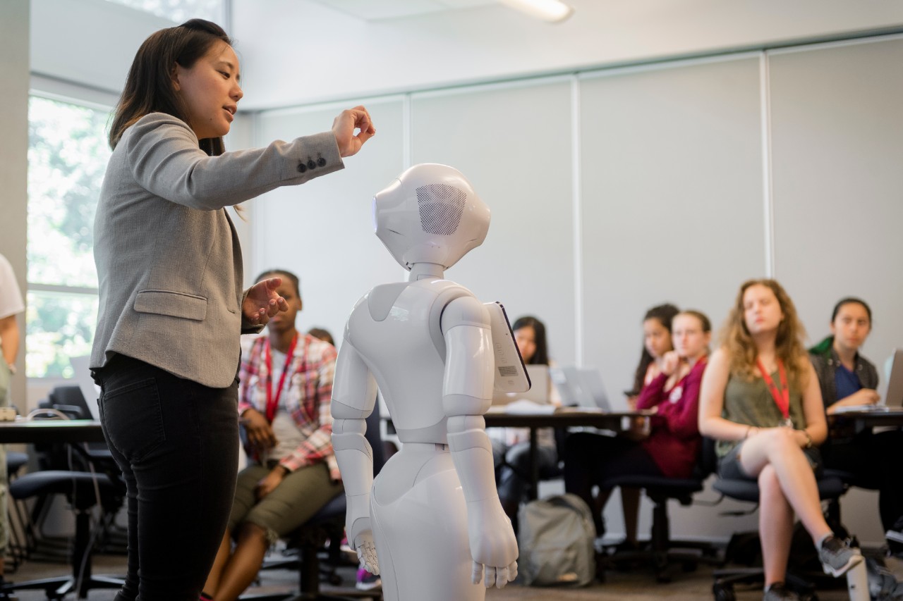 angelica lim and her humanoid robot with girls
