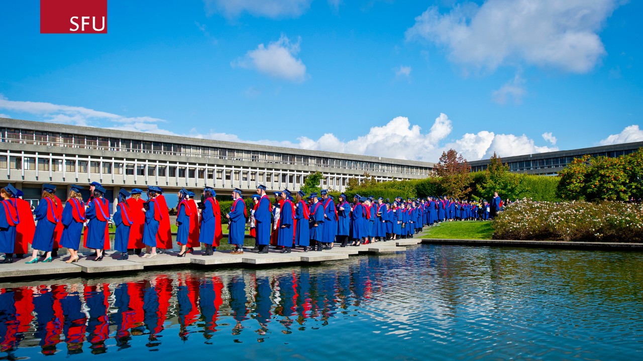 Zoom Background - Graduands crossing the AQ pond
