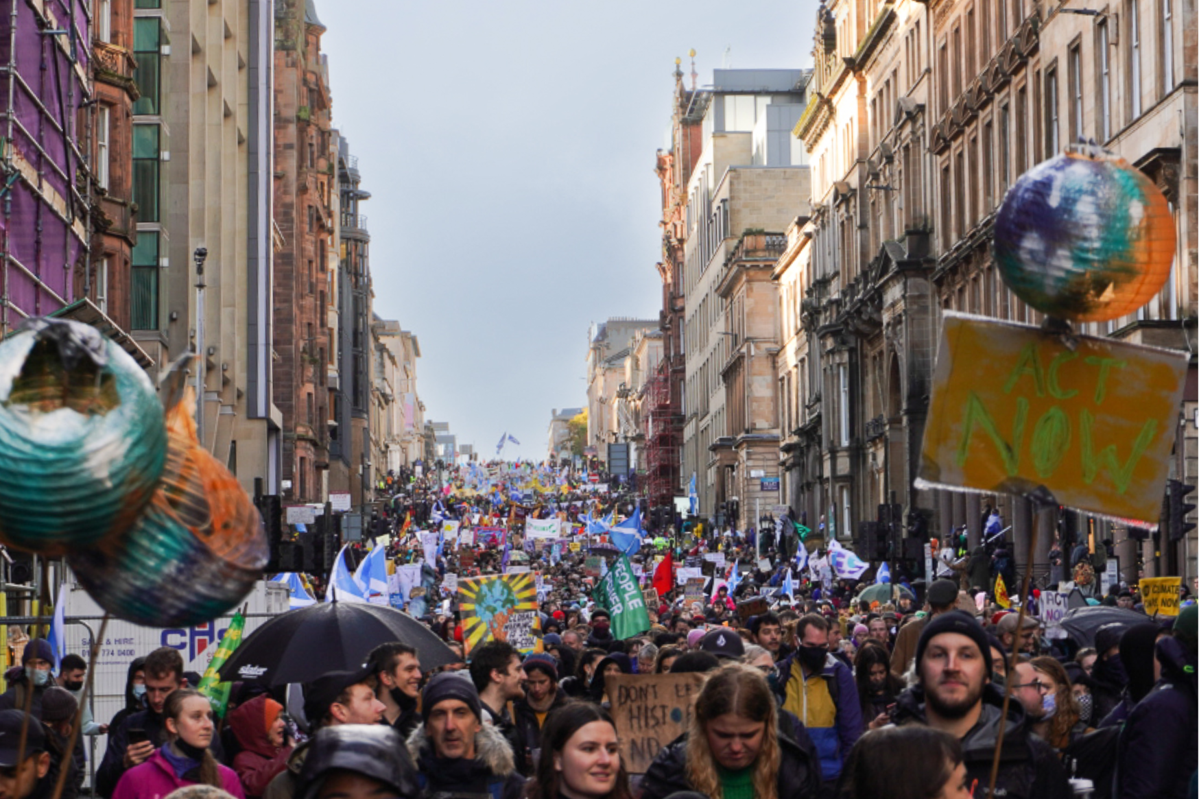 Picture of people in the streets for a rally at the COP26 conference in Glasgow UK