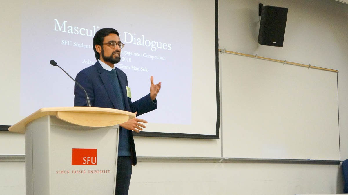 Photo: Aslam Bulbulia presents the Masculinity Dialogues project to the Student-Community Engagement Competition panel.