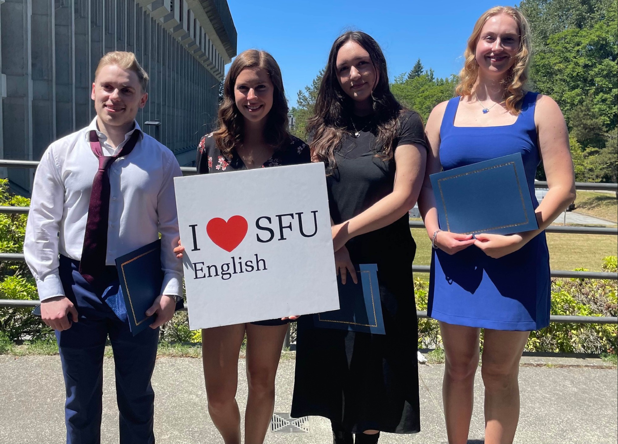 Picture of SFU English graduates from left to right: Zachary Bennett, Rebekah Osterman, Cassandra Reeves, Paige Gant