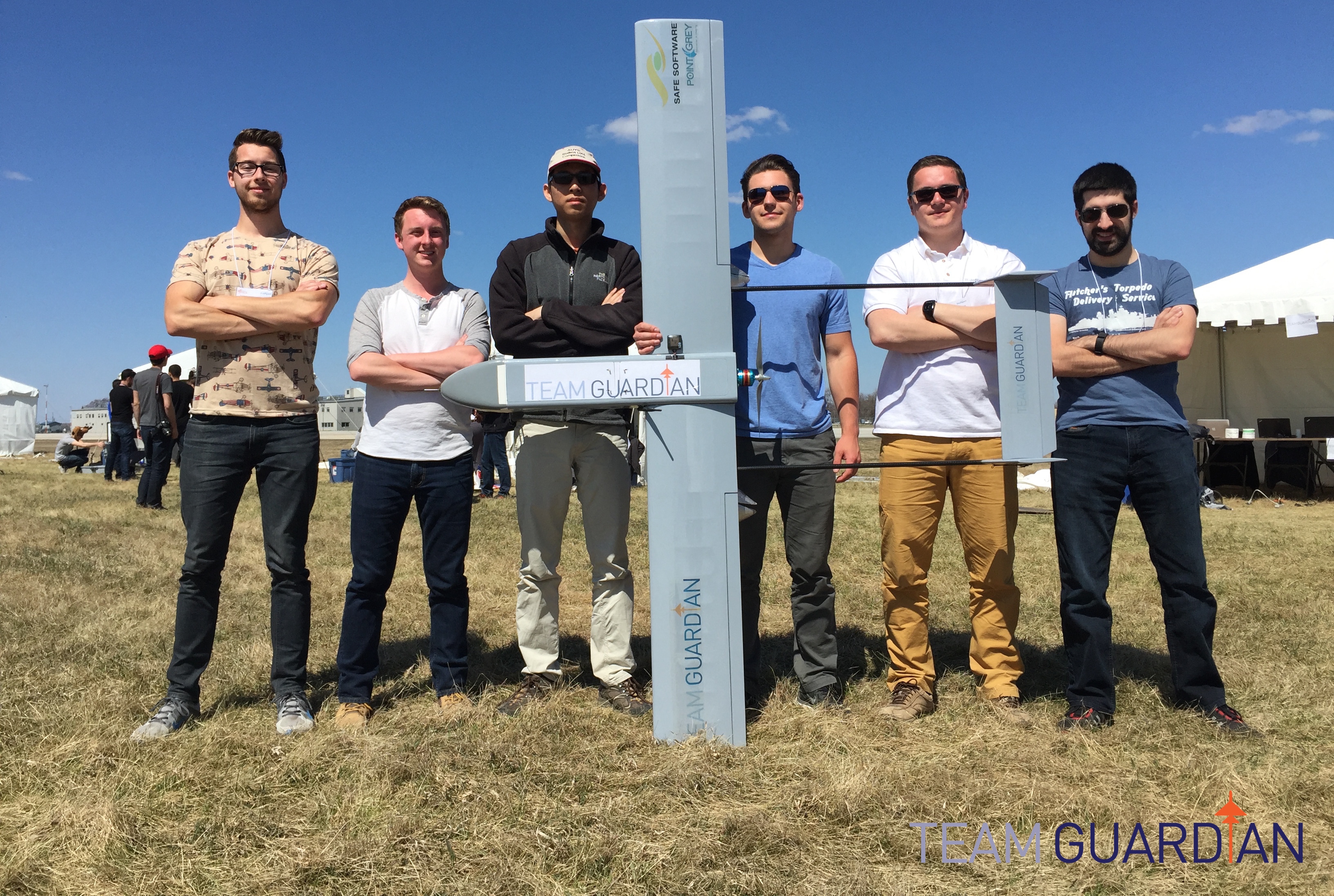 Team Guardian members Kris Gjernes, Richard Arthurs, Allan Lee, Mike Kontanist, Nikita Bazhanov and Josh Vazquez pose with Hugin, one of their unmanned aerial vehicles. Hugin was the team's competition plane in 2015 and 2016.