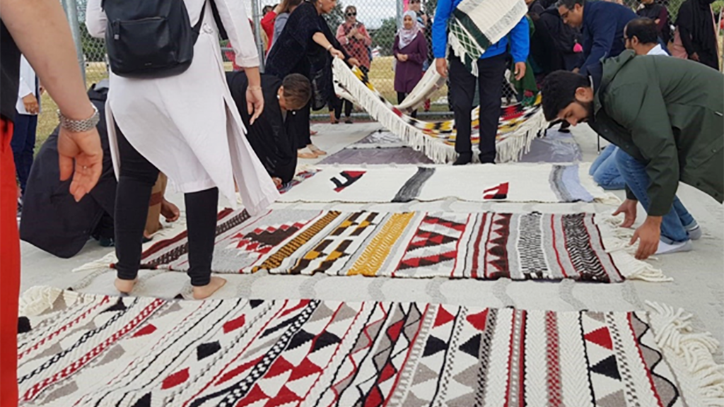 The rugs are displayed at the ceremony.