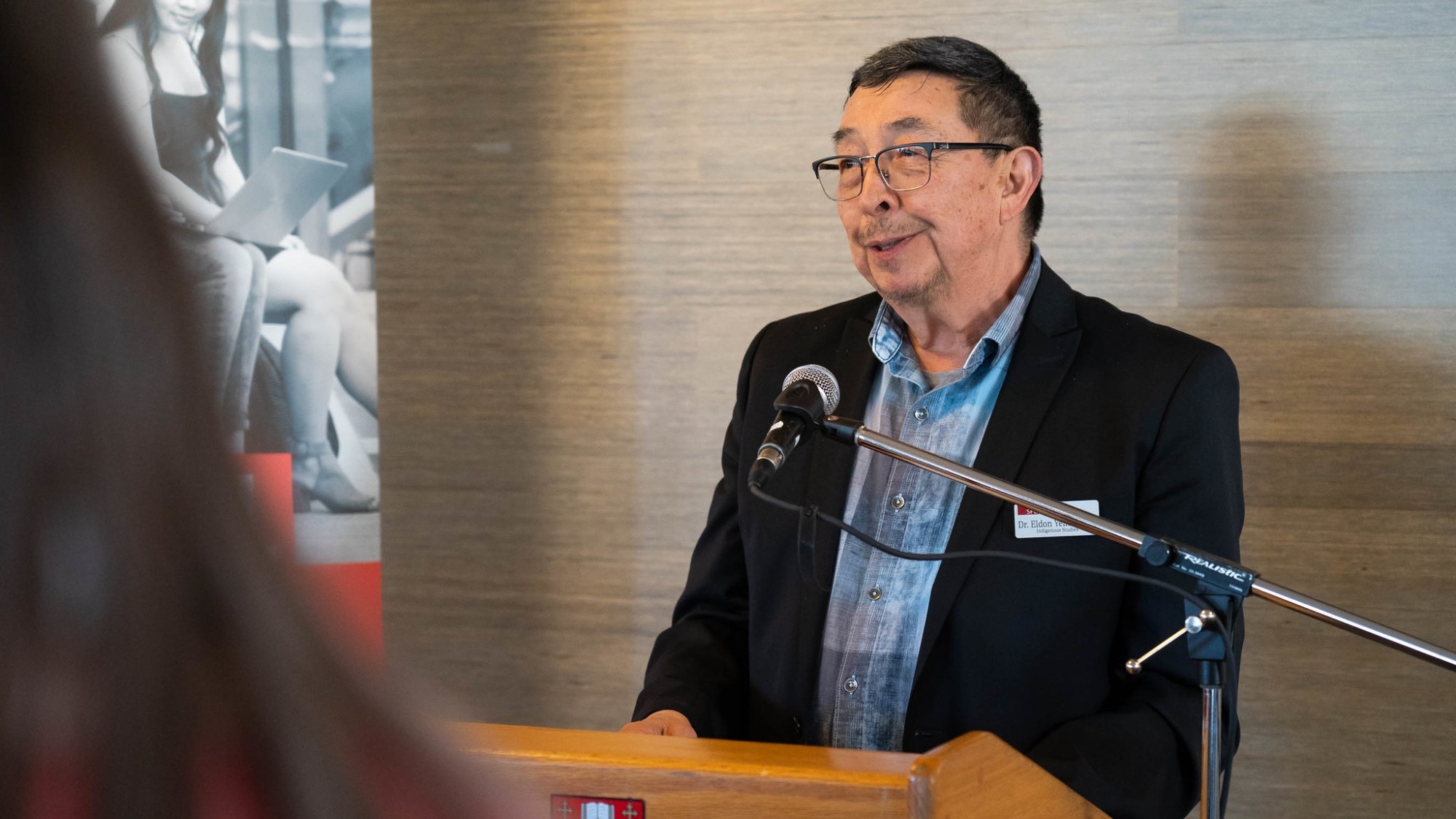 Professor and Department Chair of Indigenous Studies, Eldon Yellowhorn, gives a speech at the 2023 FASS Forum.
