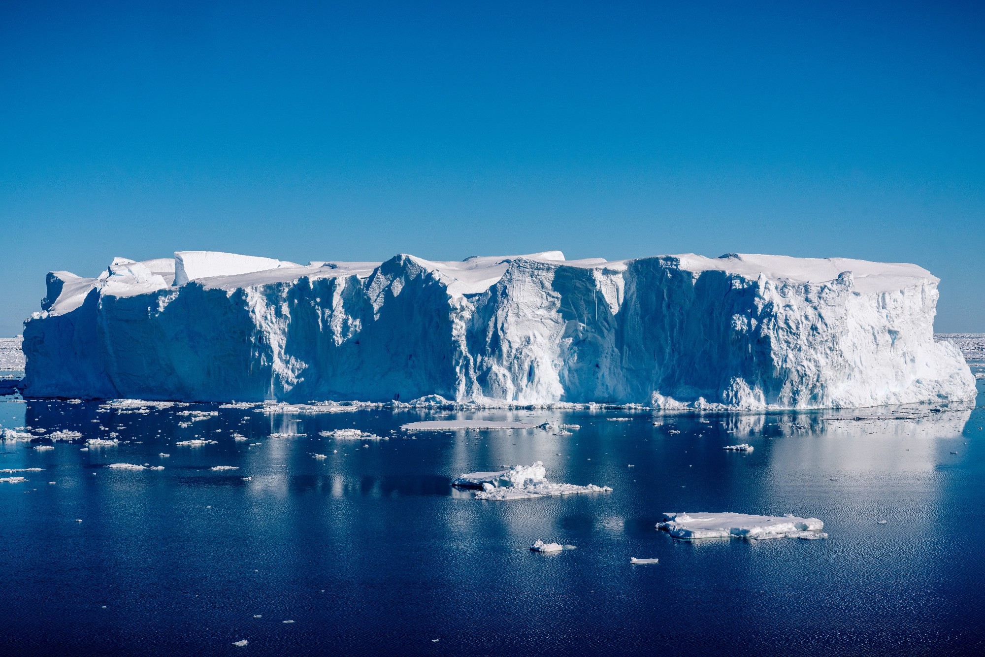 Ice berg near body of water