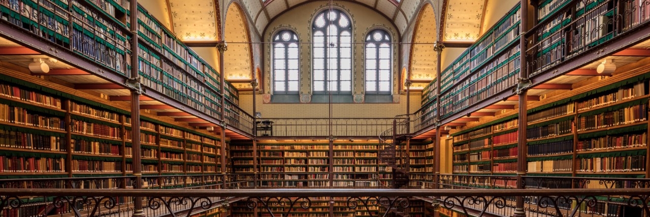 Here is a photograph taken from the library inside the Rijks Museum. Located in Amsterdam, Netherlands. Original public domain image from Wikimedia Commons