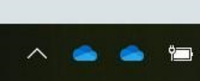 Two OneDrive icons on the taskbar