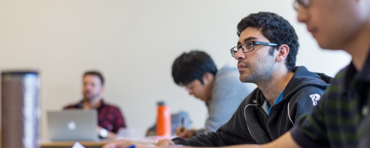 SFU Political Science student focusing in classroom