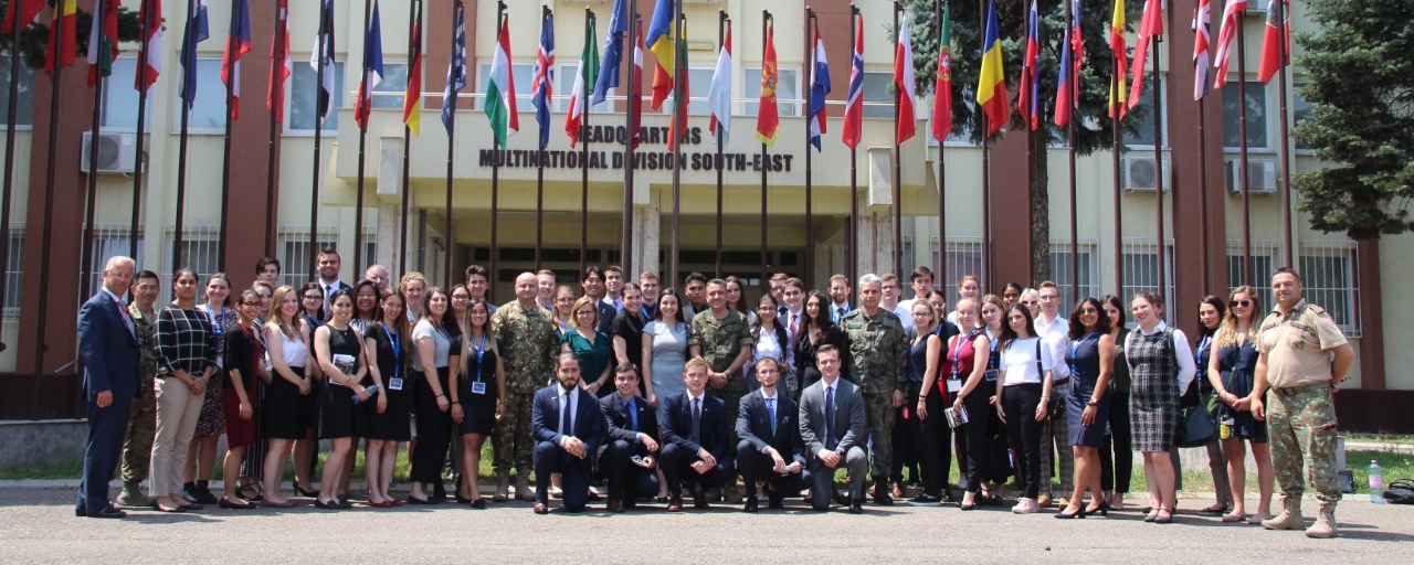 NATO Field School students in front of headquarters