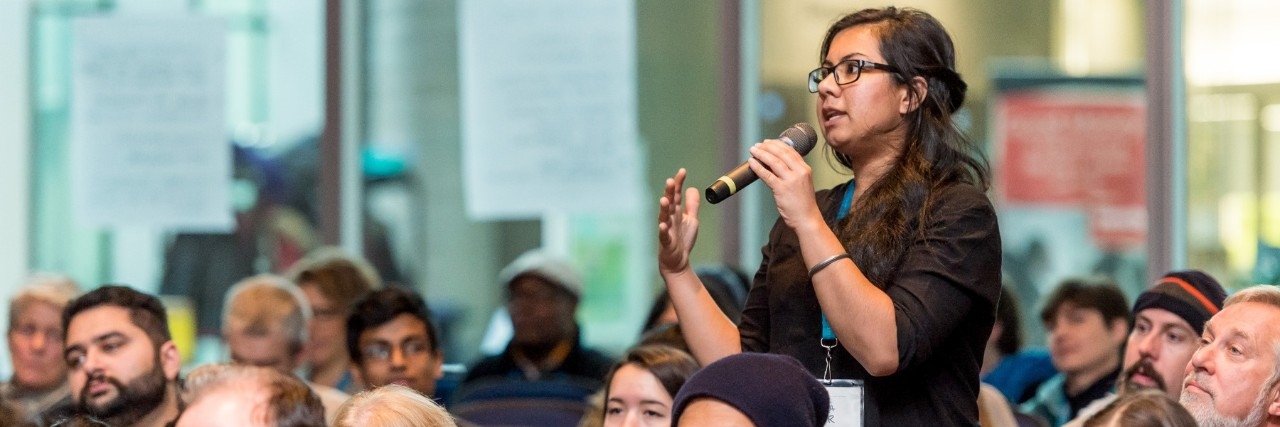 SFU student asking question at public event