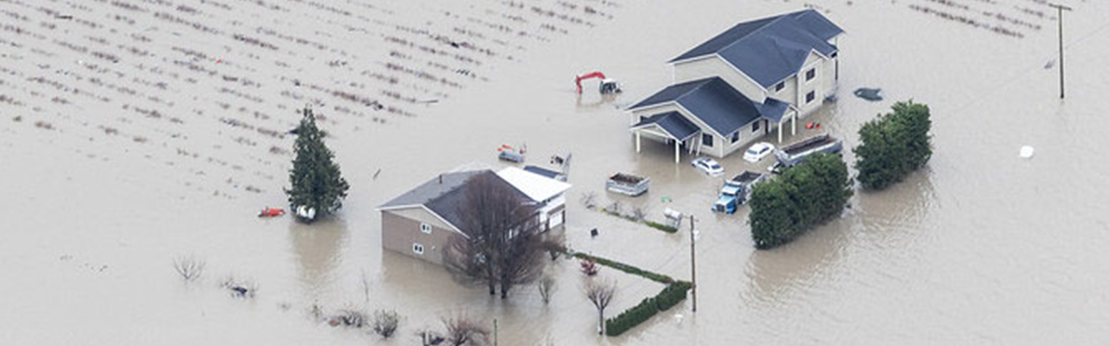 Image of houses inundated with floods and submerged in water
