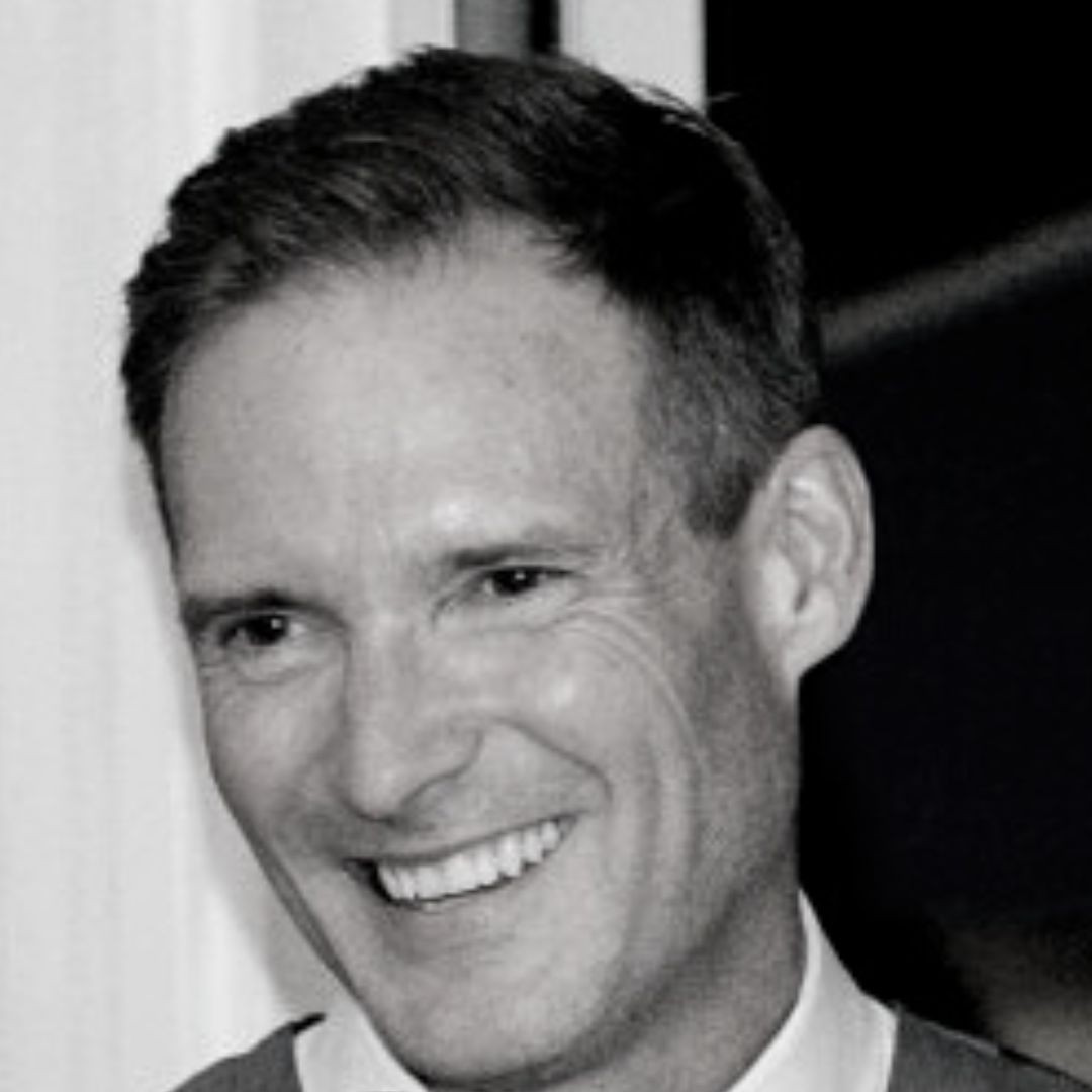 black and white headshot of Geoff Triggs