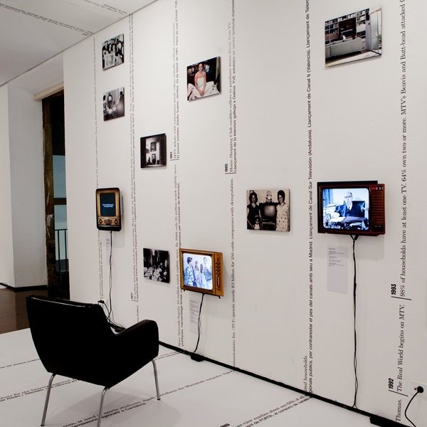 Judith Barry/Ken Saylor/Project Projects, From Receiver to Remote...channeling Spain, 2010. Installation with Spain/US timeline + TV programming, 91 photographs, 10 flat screens with audio, dimensions variable.