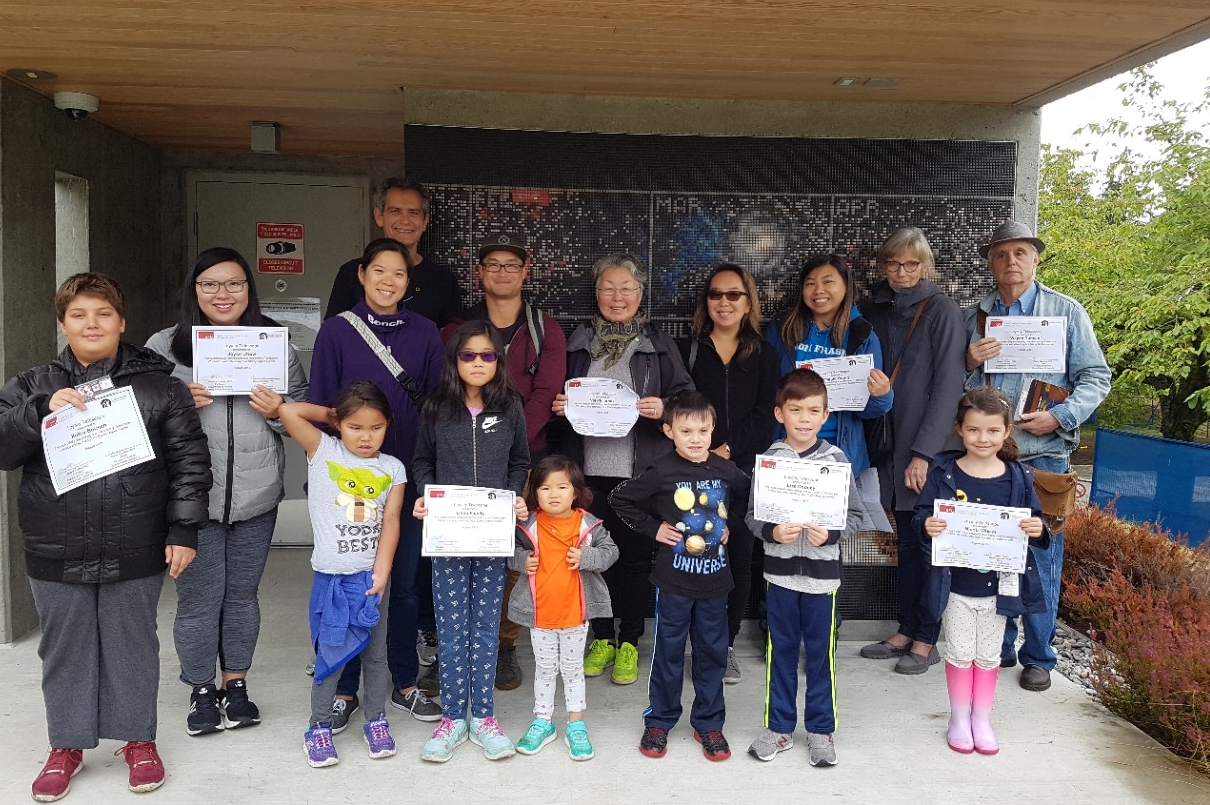 group of families holding certificates, Free Telescope Program