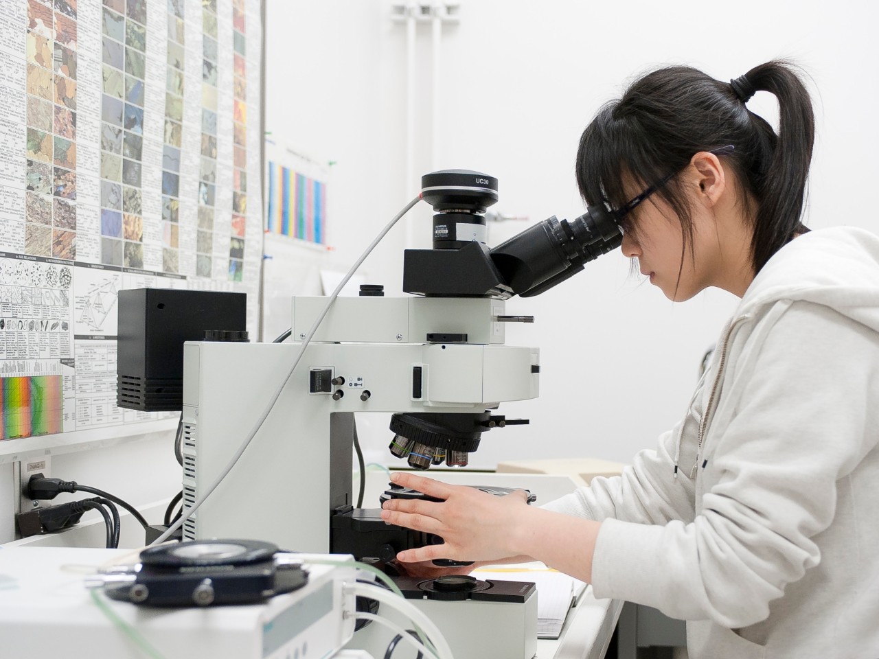 Faculties and Equipment, girl working at lab microscope