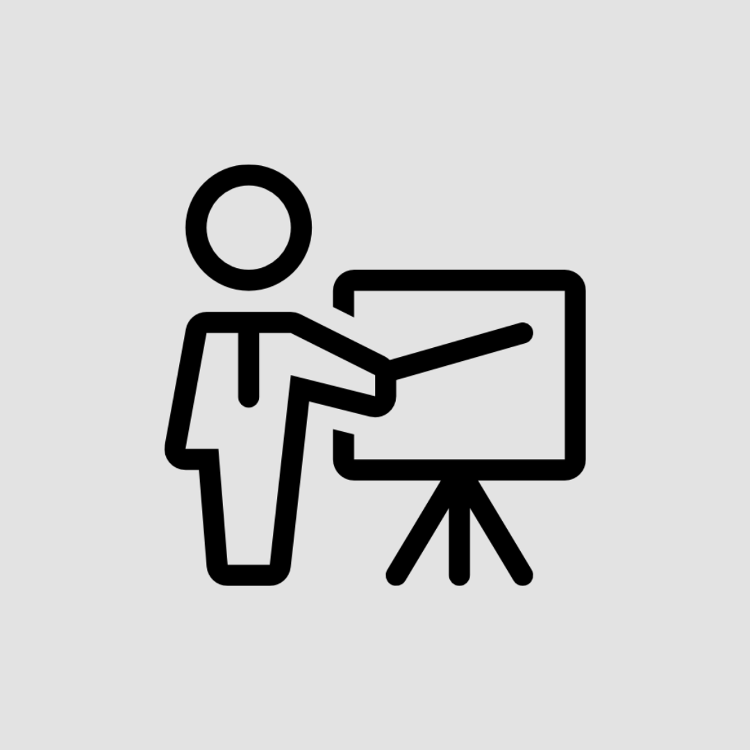 Tile with link to information for faculty and instructors -Black icon of a person pointing to a presentation board on a light grey background.