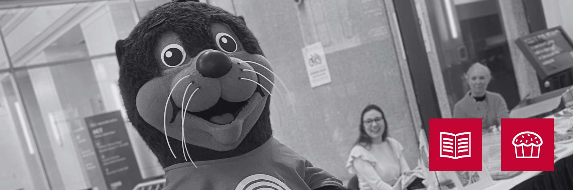 Seymour the sea otter visits the Vancouver book and bake sale
