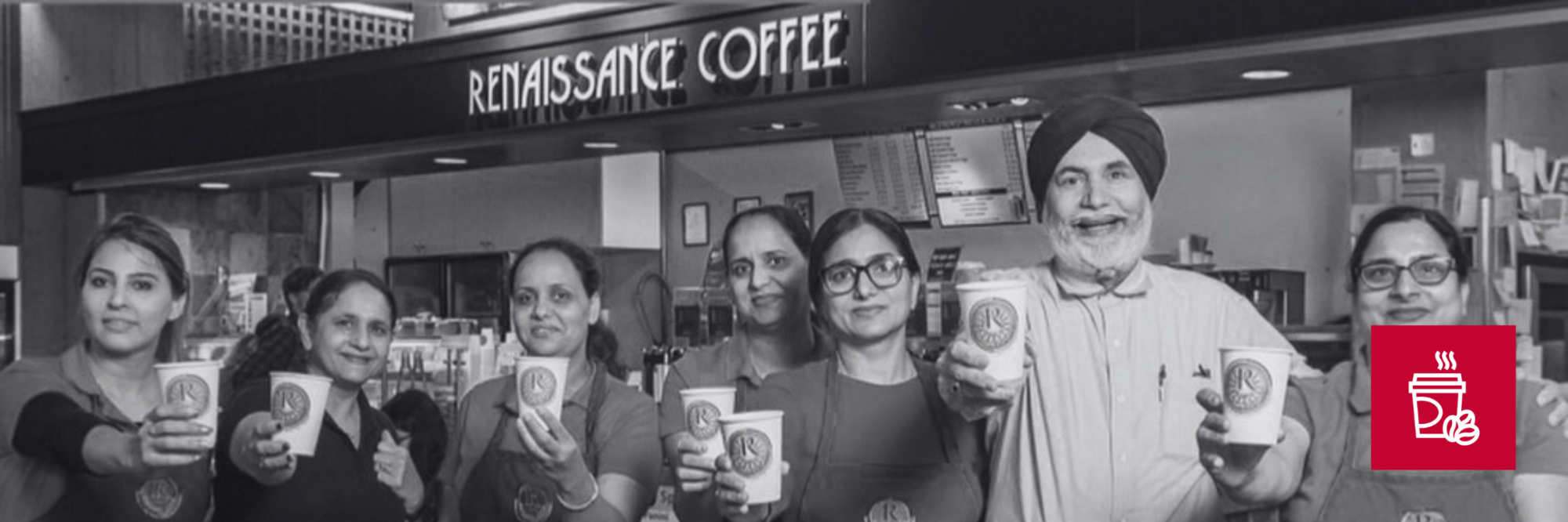 A large group of renascence coffee employees pose for a photo 