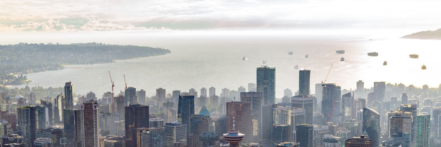 Aerial view of downtown Vancouver, including the Vancouver harbour and Harbour Centre