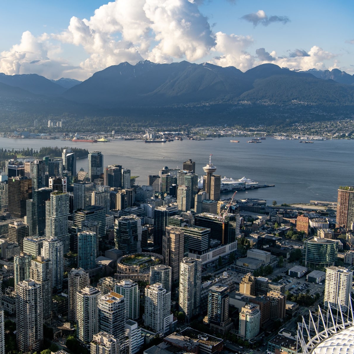 Aerial view of downtown Vancouver, including the Harbour Centre tower and the Vancouver Harbour
