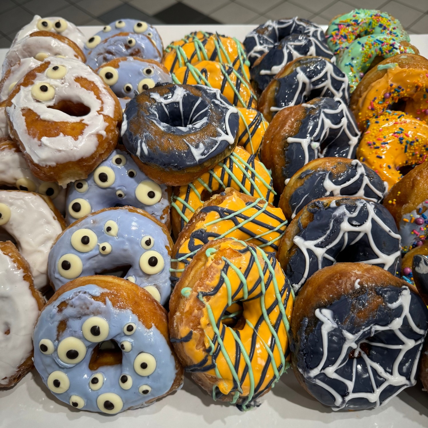 Halloween-themed glazed donuts at 2023 Halloween Social