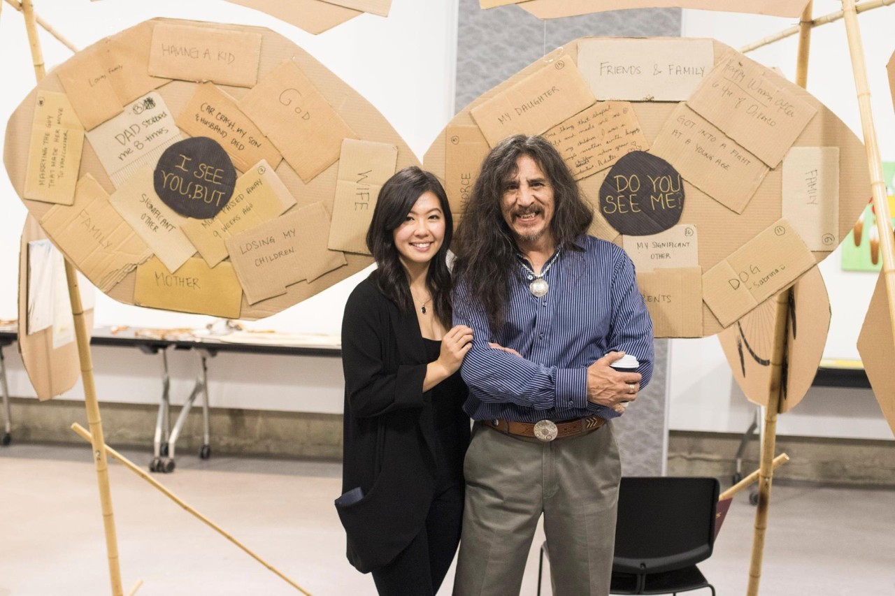 Christina Wong, a SFU alumnus, Coast Capital Savings SFU Venture Connection® Idea Prize recipient and the executive director of Employ to Empower, with Marcel Mousseau, a DTES artist who designed The Cardboard Project.